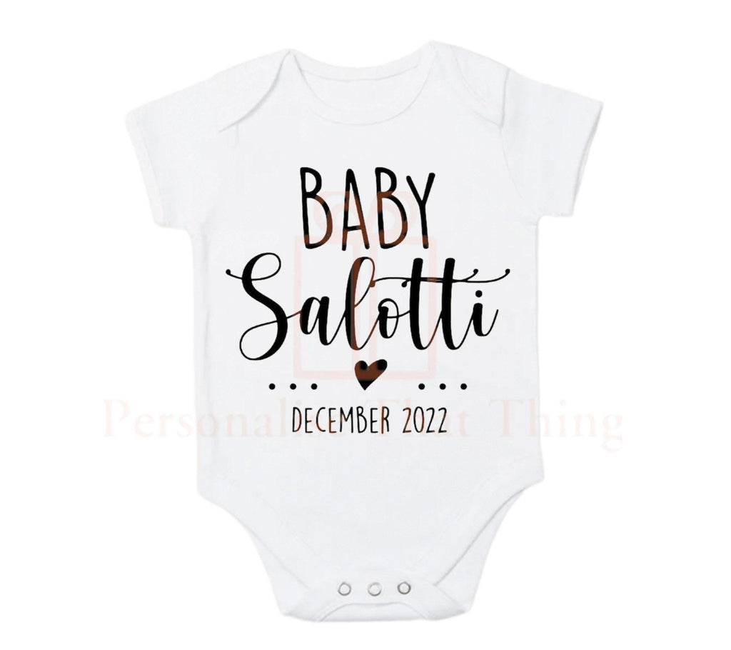 Baby surname pregnancy announcement heart baby bodysuit outfit
