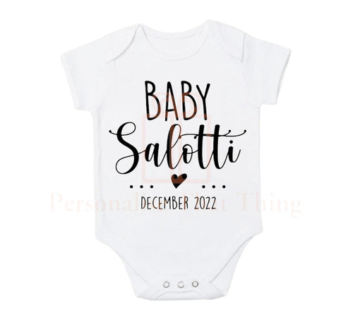 Baby surname pregnancy announcement heart baby bodysuit outfit